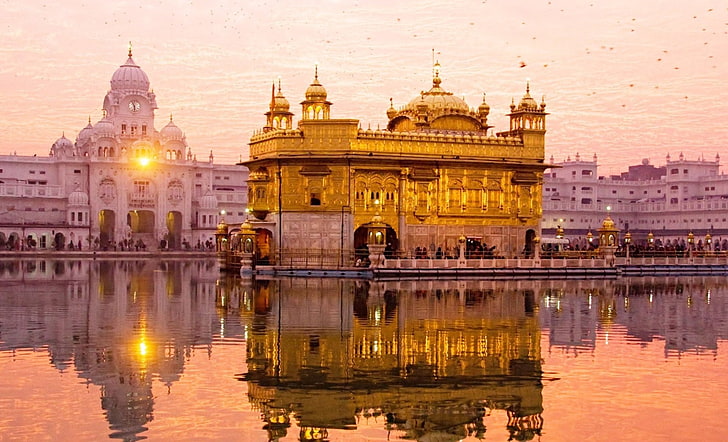 The Golden Temple at sunset, reflecting in the sarovar